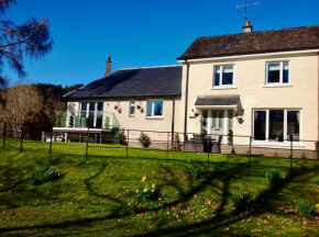 Lovely Riverside Holiday Home
